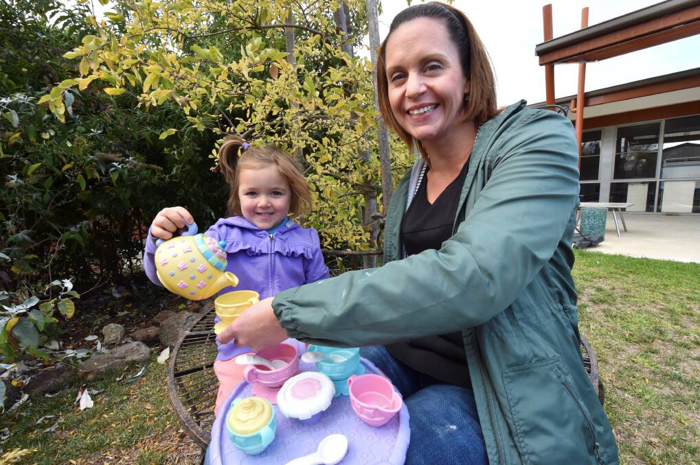 Making plans: Georgie Koros, 3, and Waubra Preschool director Naomi Ivey enjoy some play tea. PICTURE: JEREMY BANNISTER