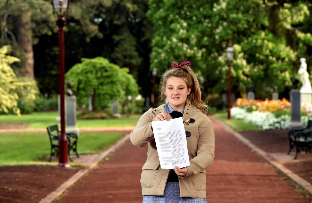 Natalie Shaw, 15, with the three-page letter she wrote to Prime Minister Tony Abbott calling on the federal government to legally recognise the love between homosexual couples.
