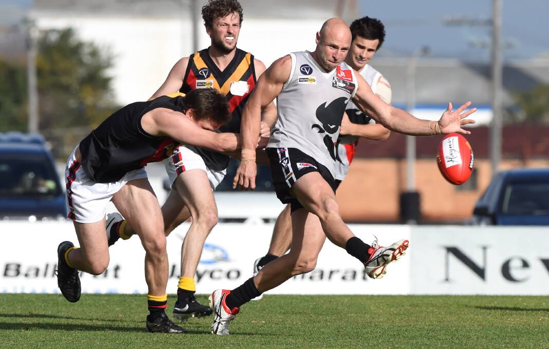 Chase: North City recruit Jarrod Edwards sends his side into attack. PICTURE: LACHLAN BENCE