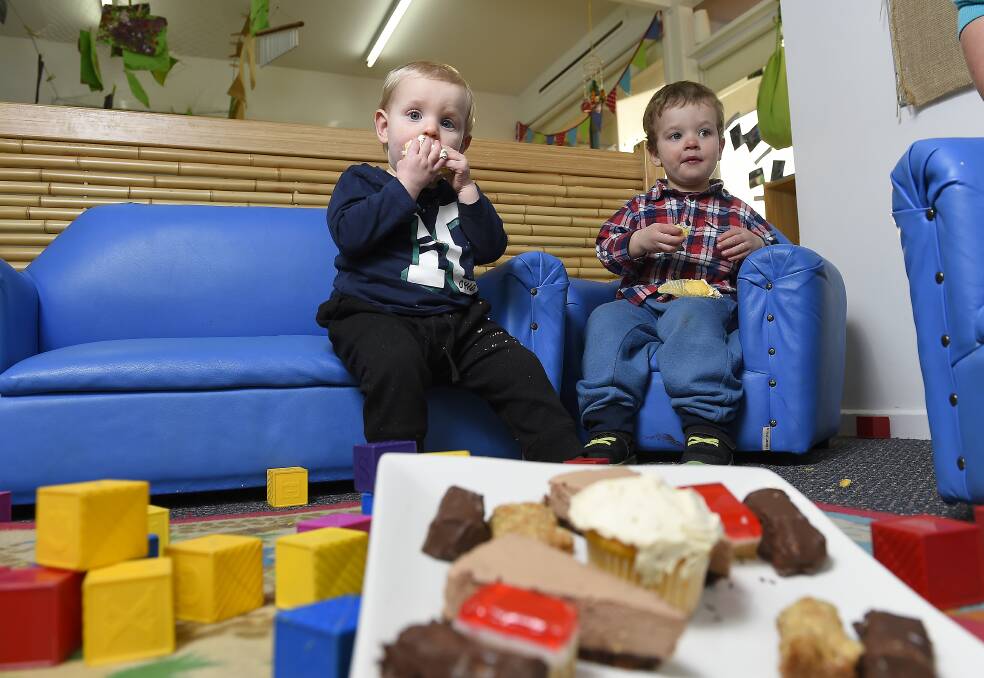 Delicious: Zaine de Jong, 12 months, and Ethan Kendrick, 2, get to enjoy their very own morning tea. PICTURE: JUSTIN WHITELOCK