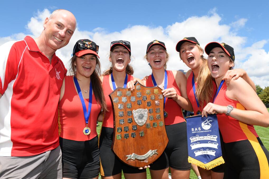 Too good: Coach Ross Henderson, Georgina Jackson (stroke), Lucy Joyce (three, captain), Julia Kittelty (two), Alice Coltman (bow) and Eliza Millen (cox) are all smiles after back-to-back Ballarat Associated Schools Girls’ Head of the Lake glory. PICTURE: KATE HEALY