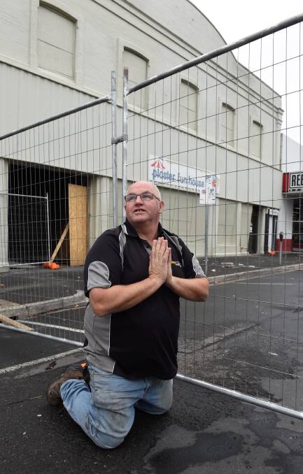 HELP: Carpet Court owner Rod McDonald prays for business to return to Grenville Street. PICTURE: LACHLAN BENCE