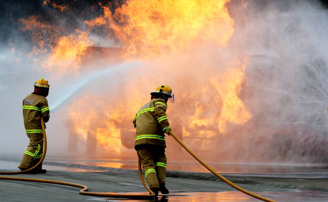 Safety fear: Firefighters go through a training exercise at the Fiskville facility. PICTURE: JEREMY BANNISTER