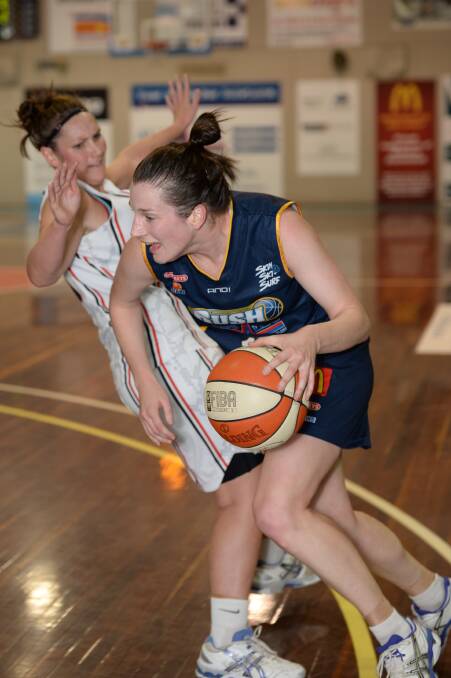 Competitive: Sarah Parsons and Kristy Rinaldi face off in a heated match. PICTURE: KATE HEALY