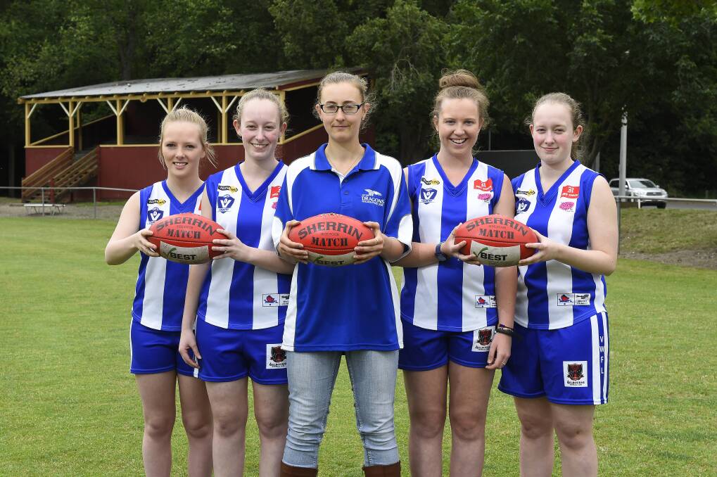 Coach needed: Hoping to find a coach for their Golden Point Women’s Football Club are, from left, Kalsey Loughnan, Zhoe Clarke, president Tegan Cross, Abby Cummins and Madalyn Clarke. PICTURE: JUSTIN WHITELOCK