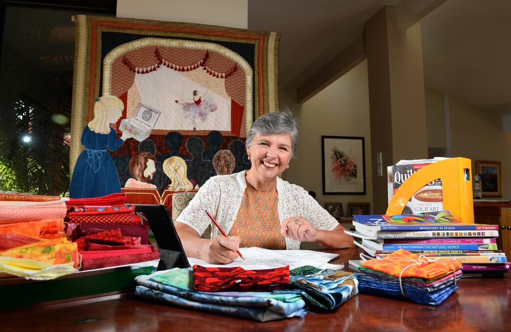 Artistic pastime: Ballarat quilter Sue Broadway surrounded by her quilts and books. PICTURE: ADAM TRAFFORD
