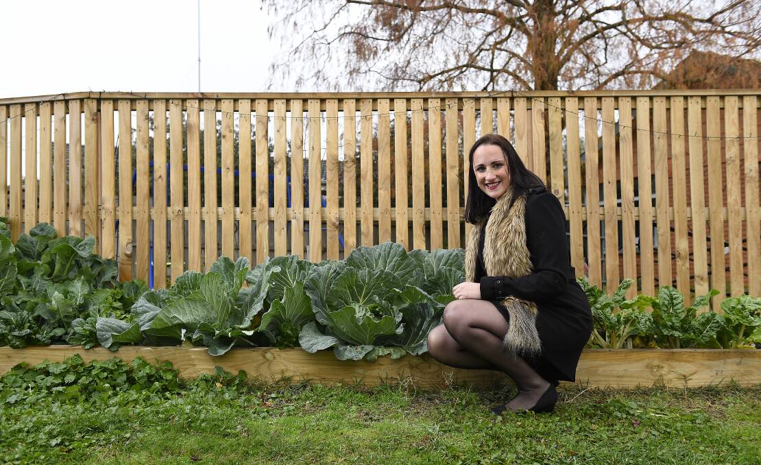 Shared garden: Ballarat City Councillor Amy Johnson is calling on the council to consider changing the current nature strip policy to enable residents to plant communal fruit and vegetable boxes out the front of their homes. PICTURE: JUSTIN WHITELOCK