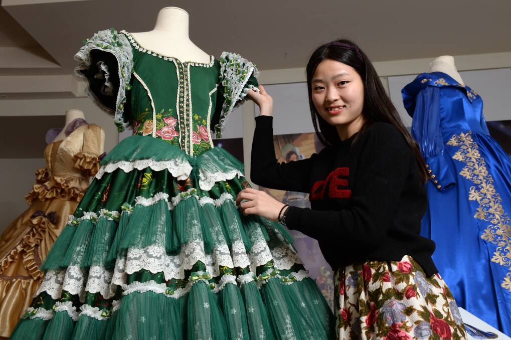 Two months to make: Cao Dan with her winning entry in Sovereign Hill’s period dress competition. PICTURE: KATE HEALY