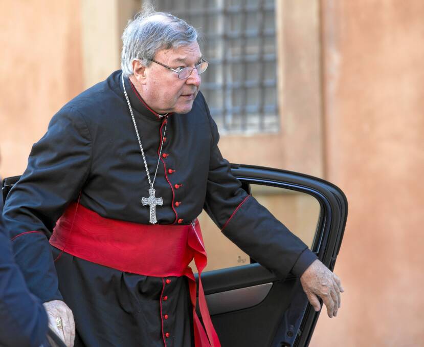 Co-operative: Cardinal George Pell at the Vatican.