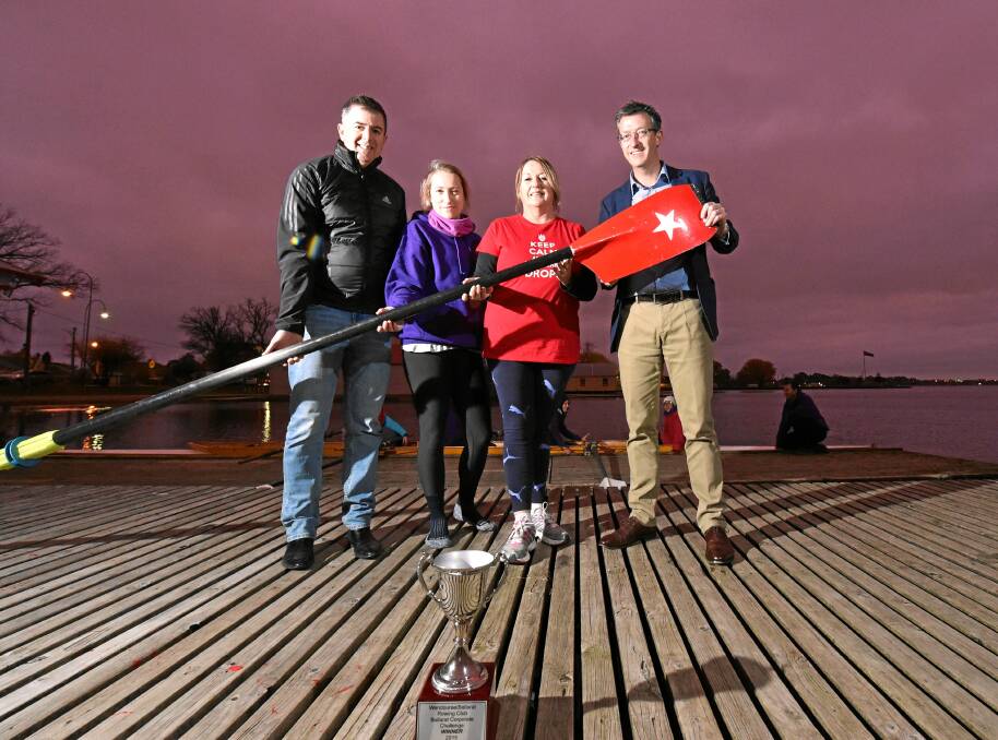 Ready to row: Getting ready for the Ballarat Corporate Challenge Regatta on Lake Wendouree are, from left, Paul Bilson of CPA Ballarat, Elaine Rooney of Phoenix Phantoms, Louise Johnson of Sovereign Hill and Andrew Faull of Heinz and Partners.
PICTURE: JEREMY BANNISTER