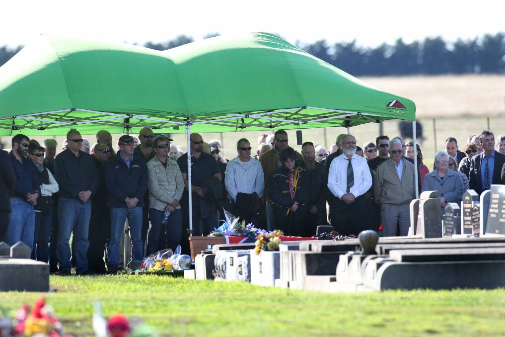 Last hurrah: More than 200 mourners gathered at Derrinallum cemetery on Tuesday afternoon to farewell Glenn Sanders. Picture: DAMIAN WHITE 