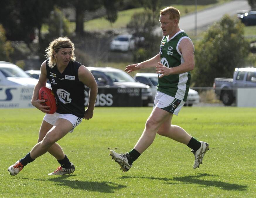 Out: Key midfielder Matthew Sheridan (left), in action for the Central Highlands last year, is out for the next few weeks while interstate.