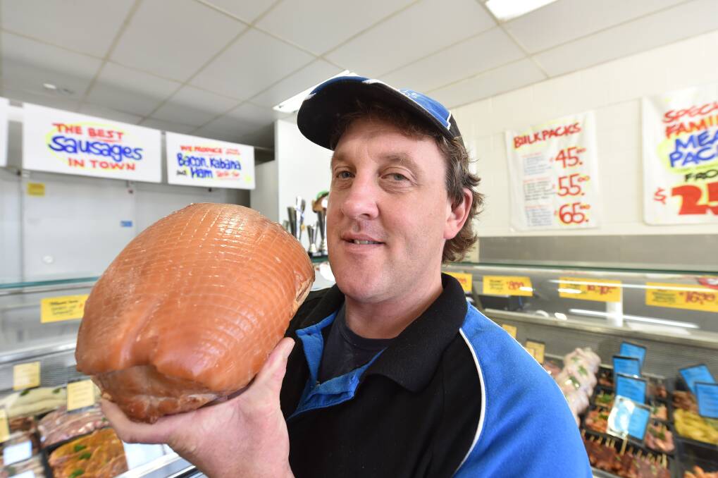 Midvale Quality Meats owner Rob Hughes and his cured ham. PICTURE: JEREMY BANNISTER