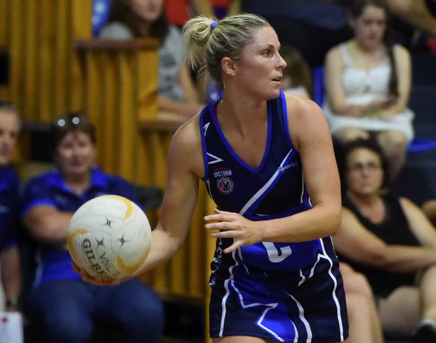 looking to pass: Sovereign Tessa Burton in action against City West on Saturday night. PICTURES: LACHLAN BENCE