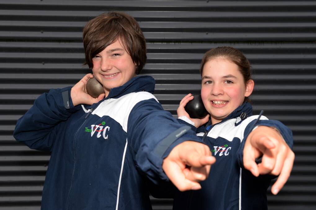 Top shot: Maddison Fogerty, 12, and Danielle Clark, 11, have been selected to represent Victoria in shot put.