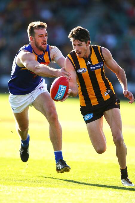Star: Hawthorn’s Isaac Smith is our number-one player midway through the 2014 season. PICTURE: GETTY IMAGES