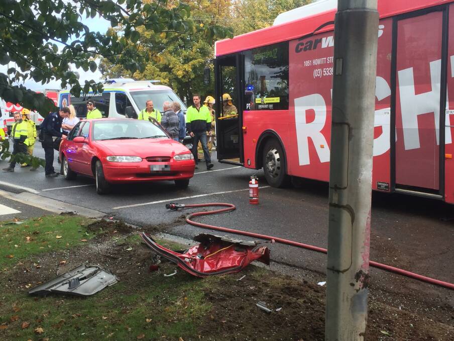 Scene: A front-seat passenger in this car was taken to hospital after a collision with a bus in Redan on Sunday afternoon.