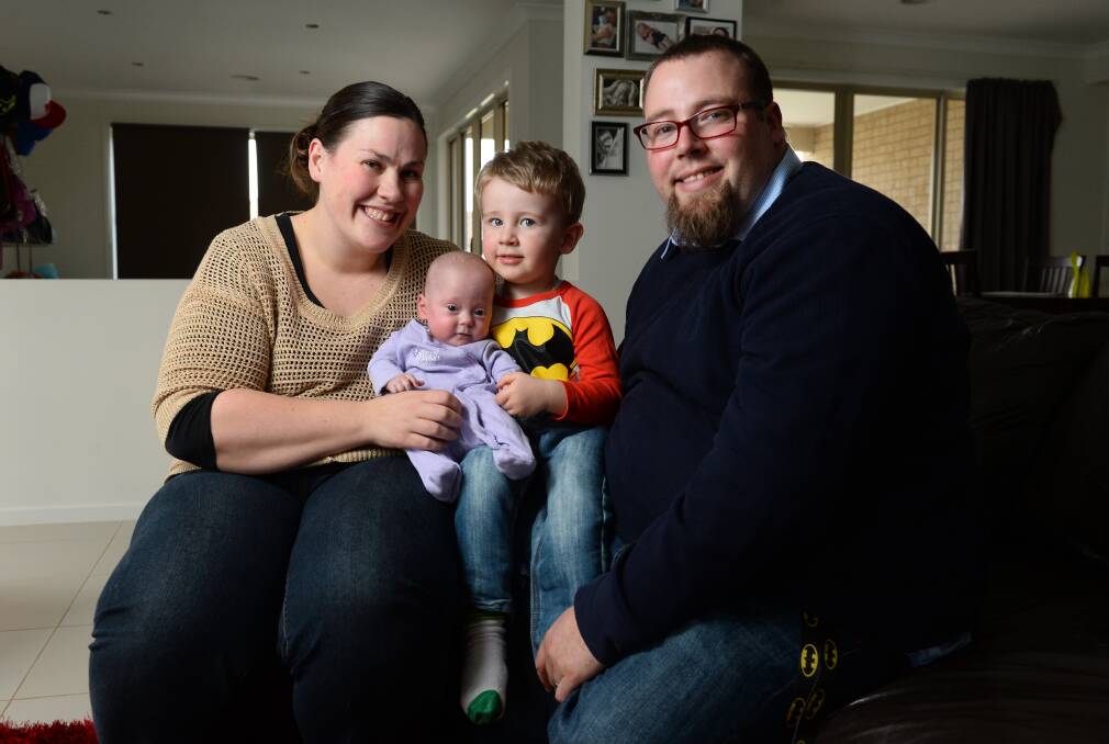 Grateful: Lauren and Justin McGeachin with their children, Lucy, five months, and Noah, 3.  PICTURE: ADAM TRAFFORD