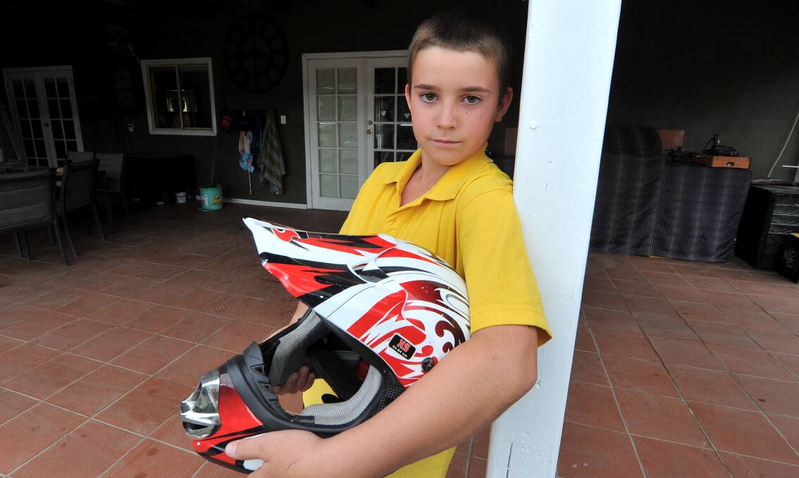 Sad: Harry Roscoe, 10, is shattered after his motorbike was stolen.
PICTURE: LACHLAN BENCE