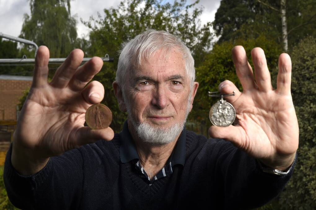 Medal mystery: Creswick resident
Neville Holmes dug up two World War I medals while gardening at his Napier Street property. Now, the search is on for descendants of the medals’ owner, Private George Bailey.
PICTURE: JUSTIN WHITELOCK