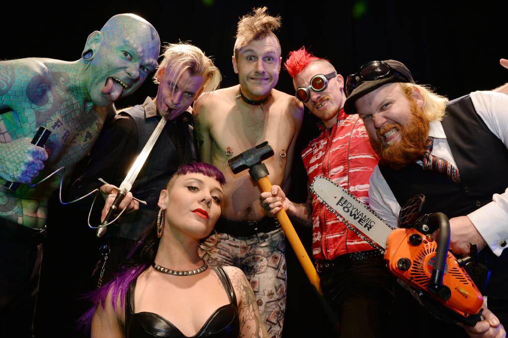 Different: Erik “The Lizardman” Sprague with fellow World Sideshow Festival performers Aerial Manx, Bam Bam, Samora Squid, Captain Ruin and The Great Gordo Gamsby. Picture: Kate Healy