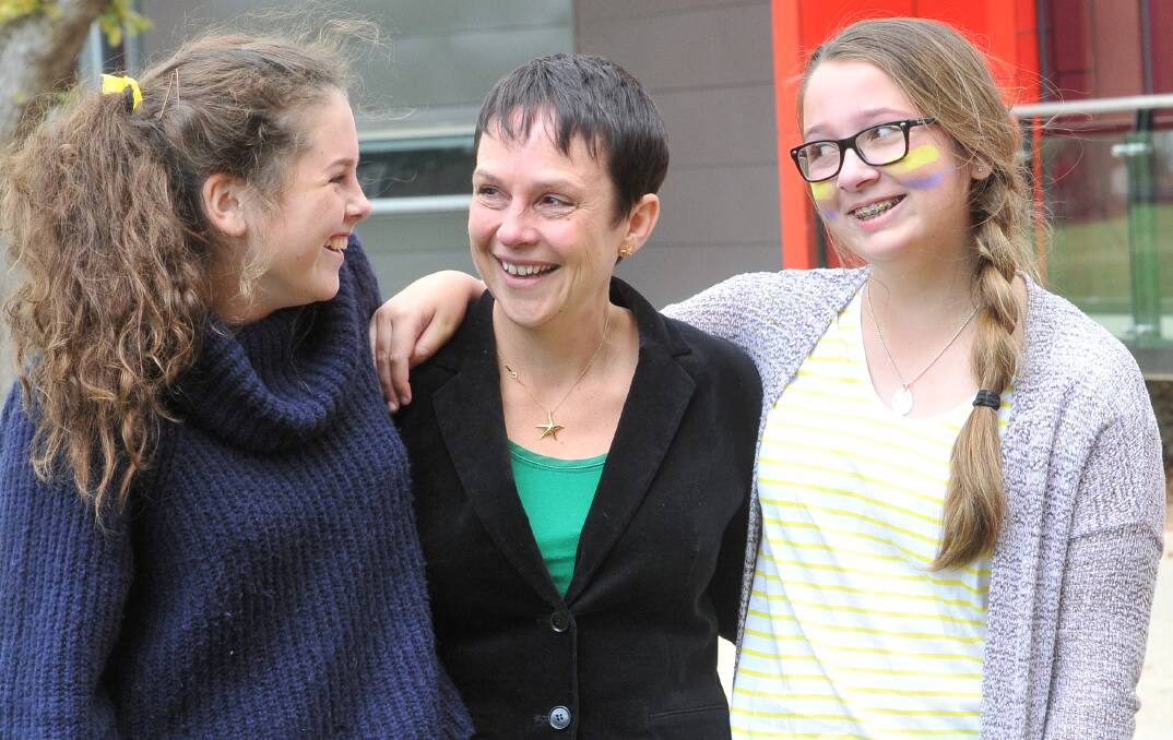 SUPPORT: Western Victoria MP and Agriculture and Regional Development Minister Jaala Pulford chats with Ballarat Clarendon College students Ruby Lockett and Lucia Ricciardi, who took part in a walkathon to raise money for Ballarat Hospice. PICTURE: LACHLAN BENCE