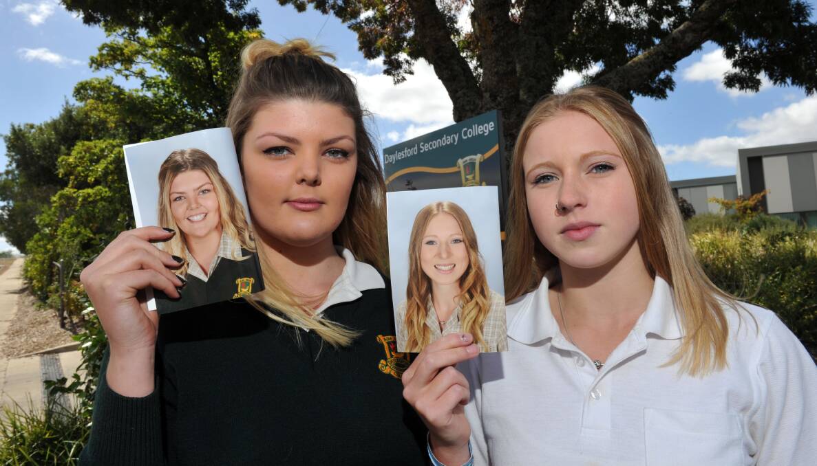 Not happy: Daylesford Secondary School students Jacki Lipplegoes and Annemieke Visser with their digitally altered school photos. picture: JULIE HOUGH