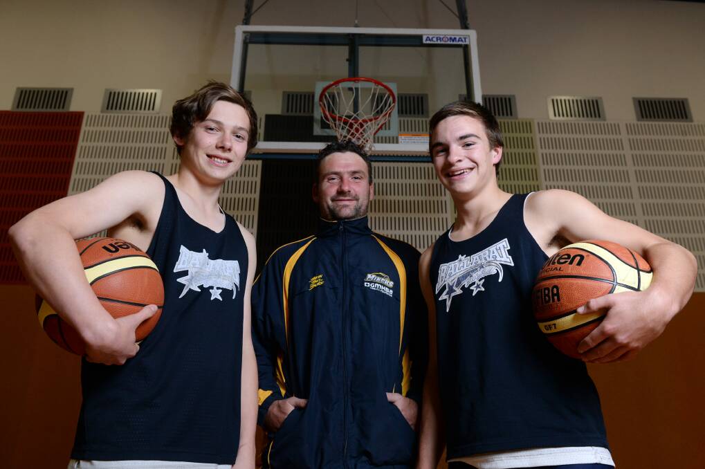 Impressing: The Miners’ James Reeves, youth league head coach Brad Cartledge and point guard James Hallett. 
PICTURE: KATE HEALY