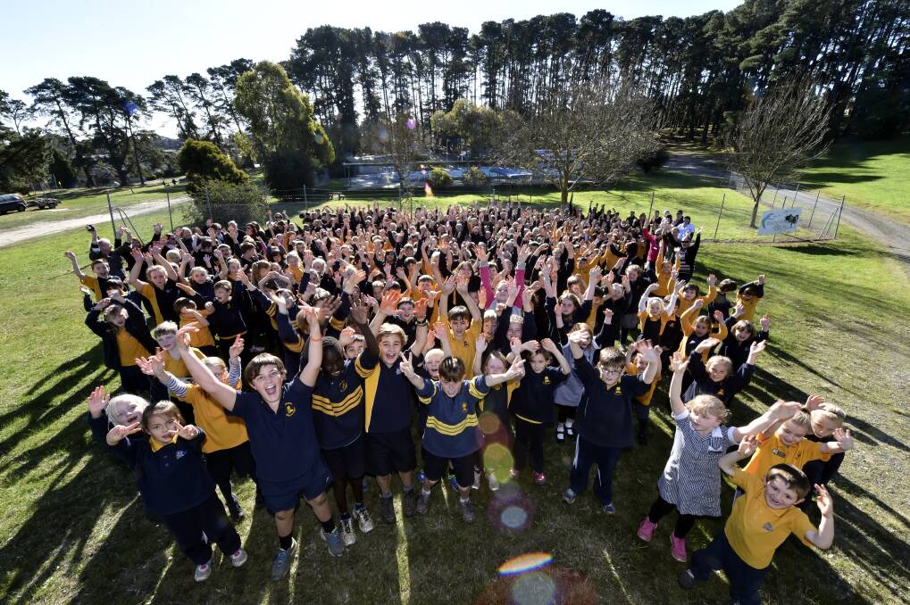 More than 500 students from the neighbouring Balck Hill Primary School celebrate the council decision to re-open the pool. PICTURE: JEREMY BANNISTER