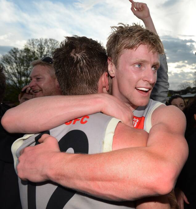 Penalised: Ryan Luke hugs Michael Todd just moments after the final siren in last year’s Ballarat Football League grand final win over Sunbury. 
PICTURE: ADAM TRAFFORD
