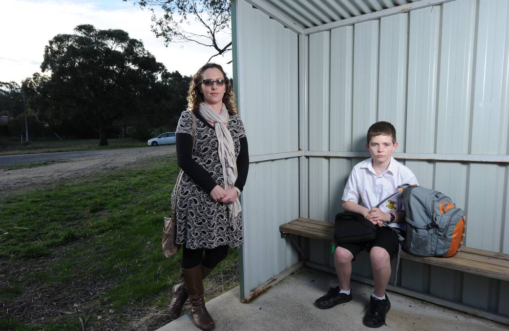 Stranded: Jacinta Bourke and her son Leo at the Springmount bus stop where Creswick students are dropped off. PICTURE: JUSTIN WHITELOCK