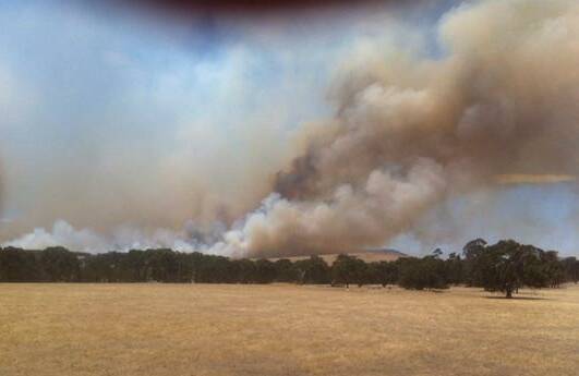 Plumes of smoke rise from a grass fire that burnt 4796 hectares near Moyston on Friday.