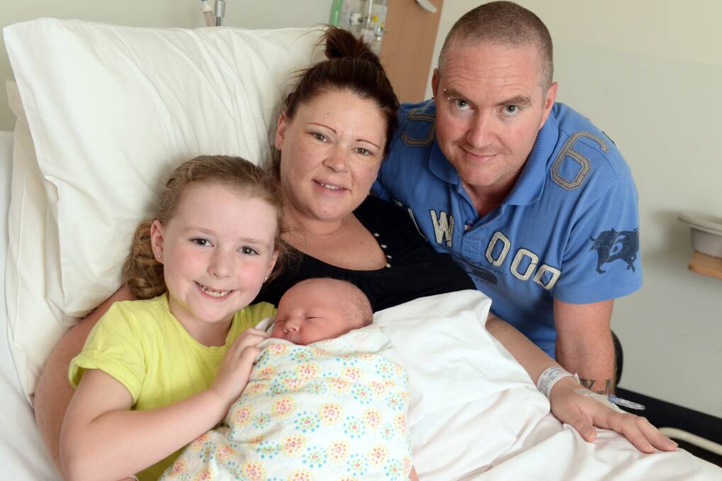 Happy family: Georgia, 6, Nicole and Greg Mahony with Jack, the newest addition to the family and one of 10,000 babies delivered across the St John of God Health Care network this year. PICTURE: KATE HEALY