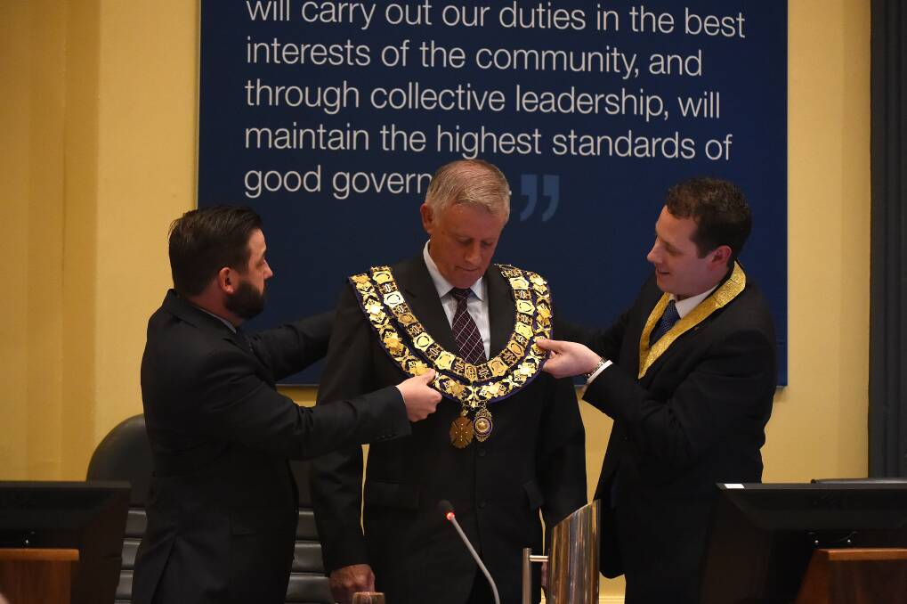OFFICIAL: City of Ballarat CEO Anthony Schinck, mayor John Philips and Cr Joshua Morris at the handover ceremony.
PICTURE: JUSTIN WHITELOCK