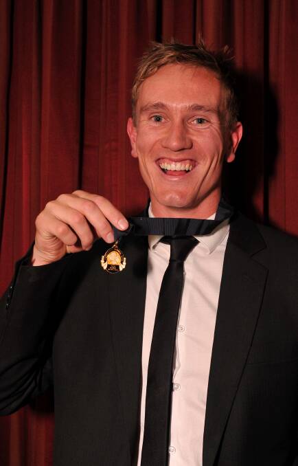 Myles Sewell with his 2009 JJ Liston Trophy.