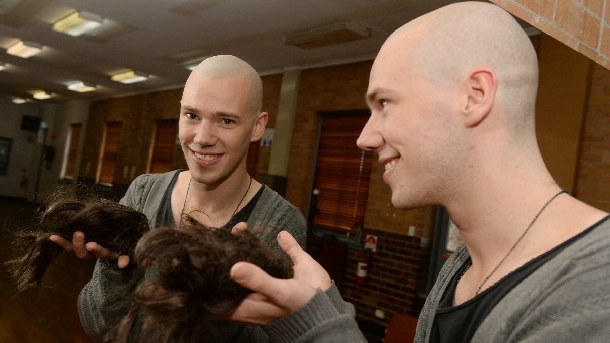 Joel Conroy, a teacher at The Dance Studio, cut off his waist-length hair for charity.  PIC: KATE HEALY