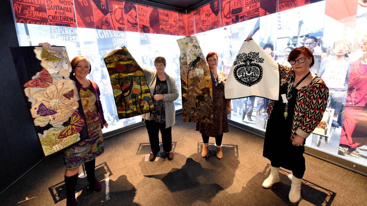 From left to right Melbourne visual artist Fiona Crawford, Kaye Bathurst of the Ballaarat branch Embroiderers Guild, Suzanne Lyle of the Ballarat Quilters and MADE marketing and retail manager Zoe Bradshaw have issued a challenge to quilters across Australia. Picture: JEREMY BANNISTER