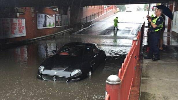 A Maserati was flooded after the driver tried to navigate a flooded underpass in Seddon on Saturday Photo: Sarah Schubert/Facebook