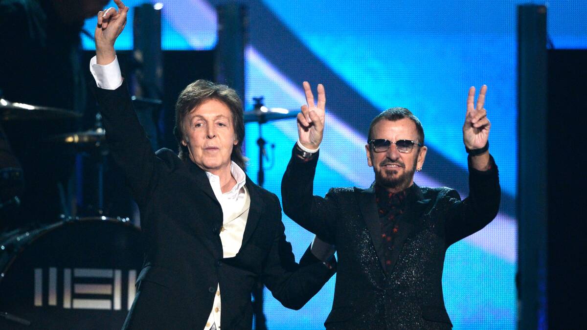 Musicians Paul McCartney (L) and Ringo Starr of The Beatles perform onstage during the 56th GRAMMY Awards at Staples Center on January 26, 2014 in Los Angeles, California. Photo: GETTY IMAGES