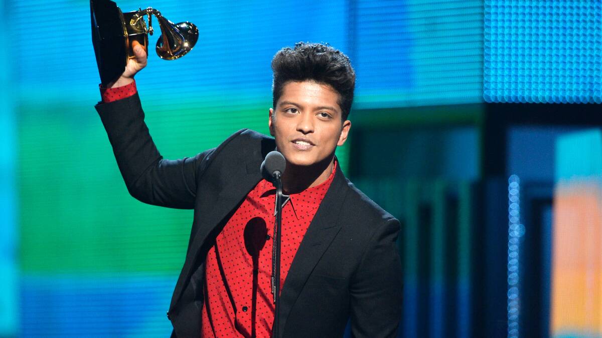 Musician Bruno Mars accepts the Best Pop Vocal Album award for 'Unorthodox Jukebox' onstage during the 56th GRAMMY Awards at Staples Center on January 26, 2014 in Los Angeles, California. Photo: GETTY IMAGES