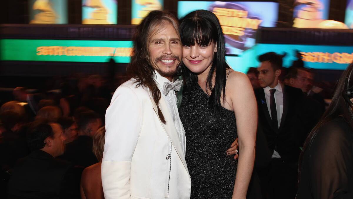 Singer Steven Tyler (L) and actress Pauley Perrette attend the 56th GRAMMY Awards at Staples Center on January 26, 2014 in Los Angeles, California. Photo: GETTY IMAGES