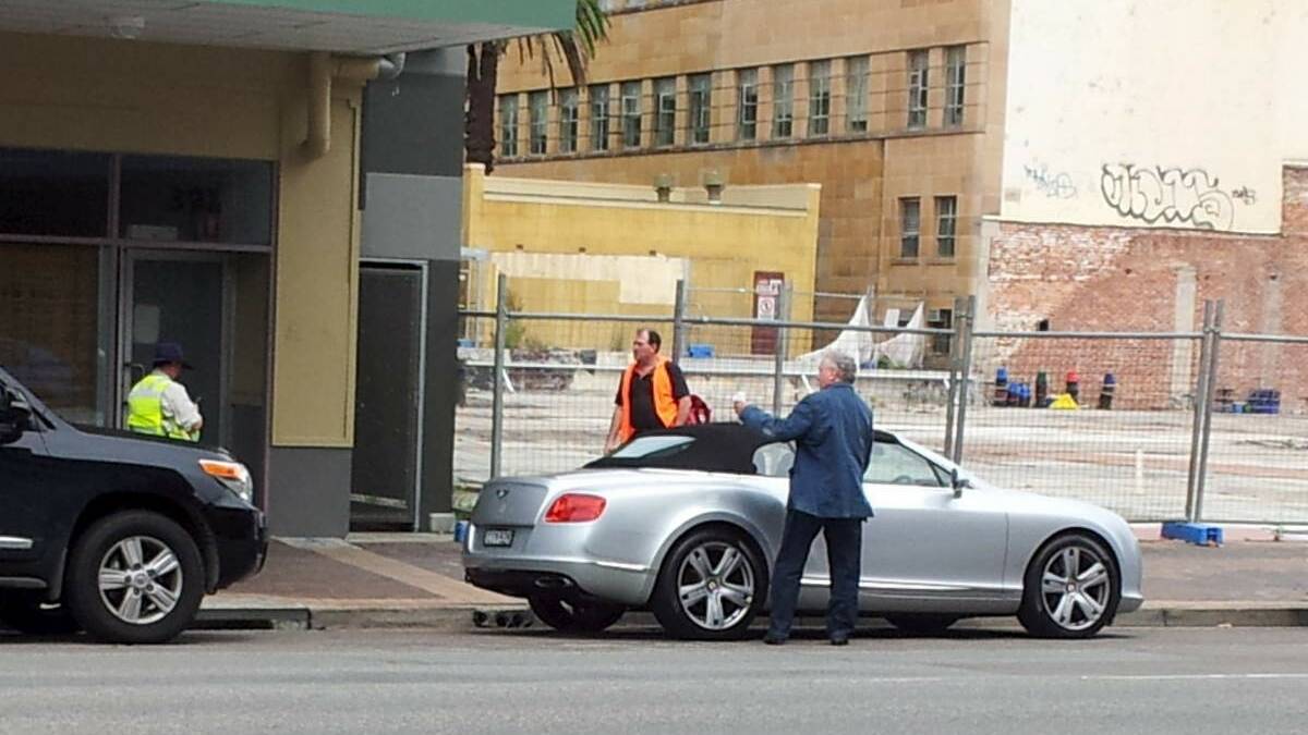 WHEELS AND DEALS: Jeff McCloy and his Bentley in Newcastle ... it’s alleged he handed over almost $10,000 to Andrew Cornwell while they were in the developer’s car.