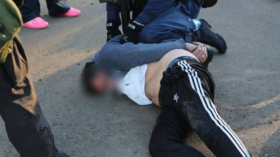 TAKEDOWN: A man is arrested in Berry during the co-ordinated ice raids conducted as part of the ongoing Operation Croci. 