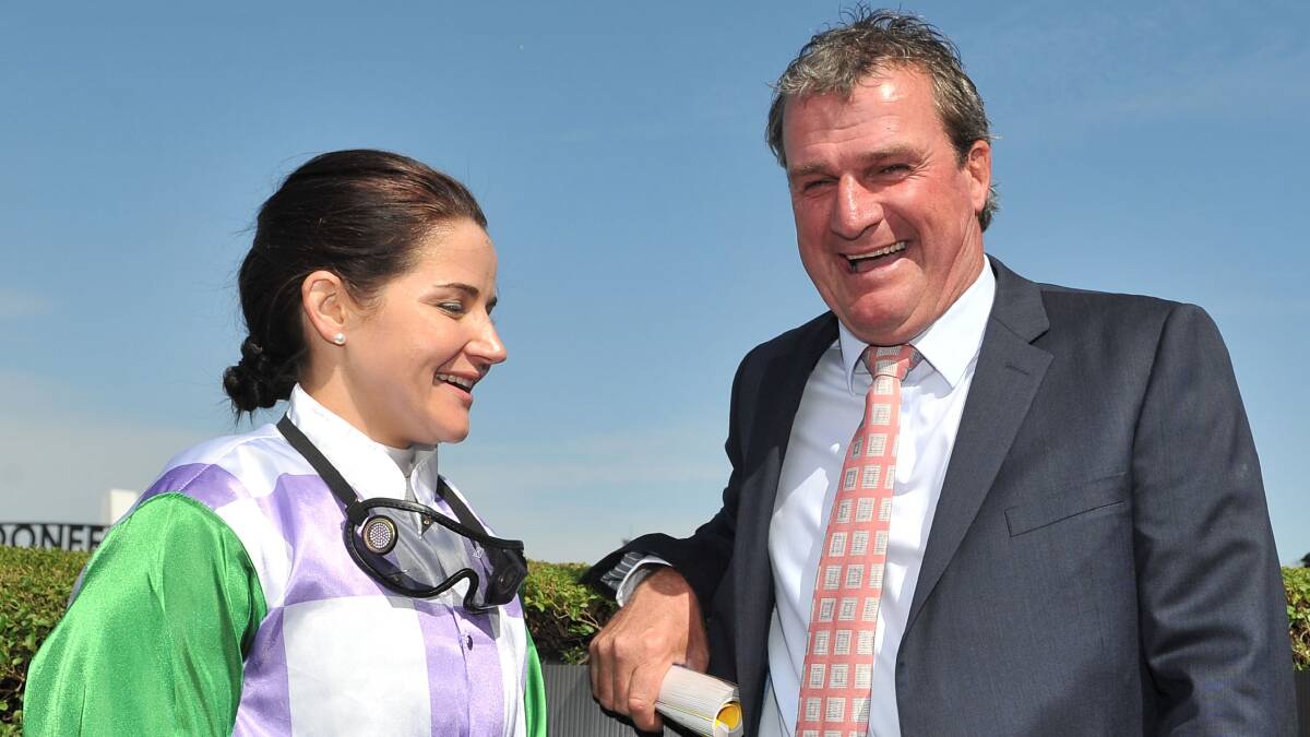 Michelle Payne and Darren Weir are all smiles after guiding Prince of Penzance to victory in the Moonee Valley Gold Cup on Saturday. Photo: Getty Images
