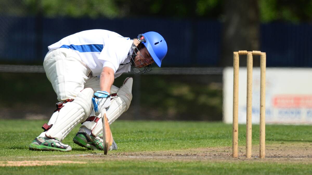 Golden Point captain Josh White pushes hard for runs against North Ballarat at the Eastern Oval. Photo: Adam Trafford 