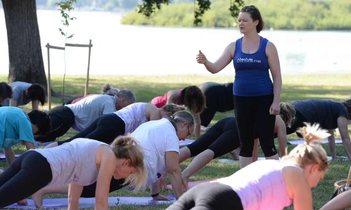 Absolute Yoga's Tracey Hargreaves takes a yoga class  at Lake Wendouree.