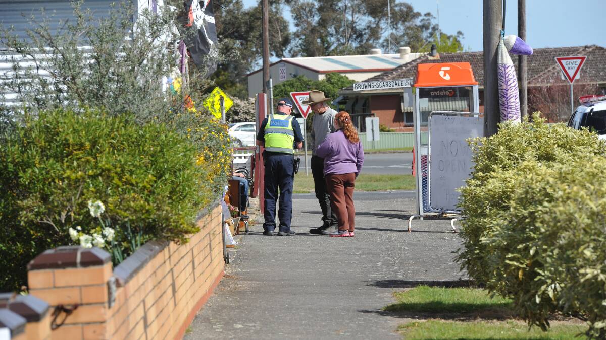 Police speak to witnesses at the scene. PICTURE: LACHLAN BENCE
