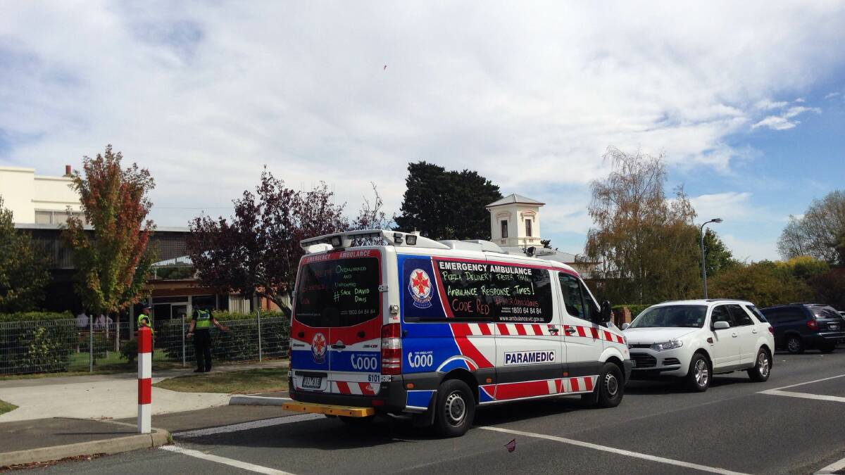An ambulance arrives at the school on Monday. PICTURE: TOM COWIE