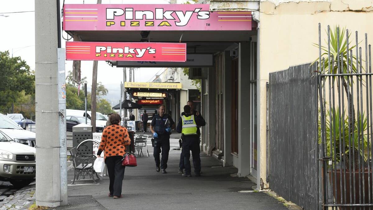Police search the area for clues following the armed robbery on Tuesday afternoon. PHOTOS: Justin Whitelock