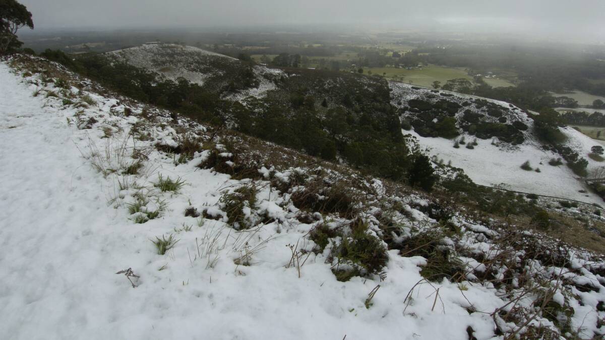 Think it's cold today? Nowhere near as cold as back in 2008, when Mt Buninyong was covered in snow. PICTURE: LACHLAN BENCE